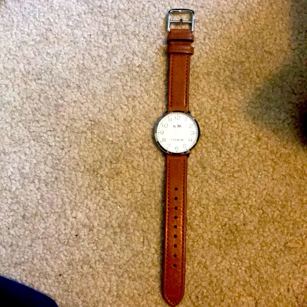 Adorable woman’s coach leather watch